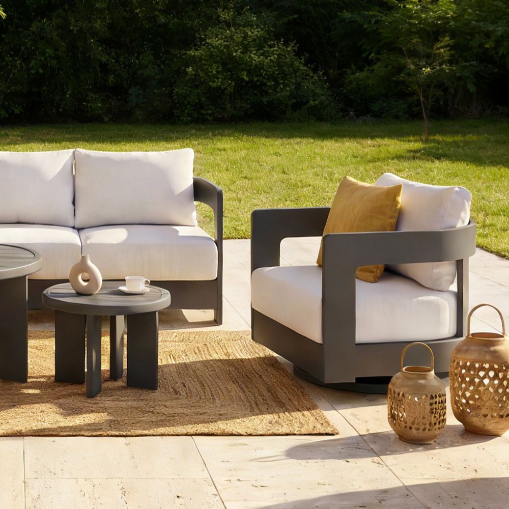 Outdoor patio furniture set with white cushions and black aluminum frame