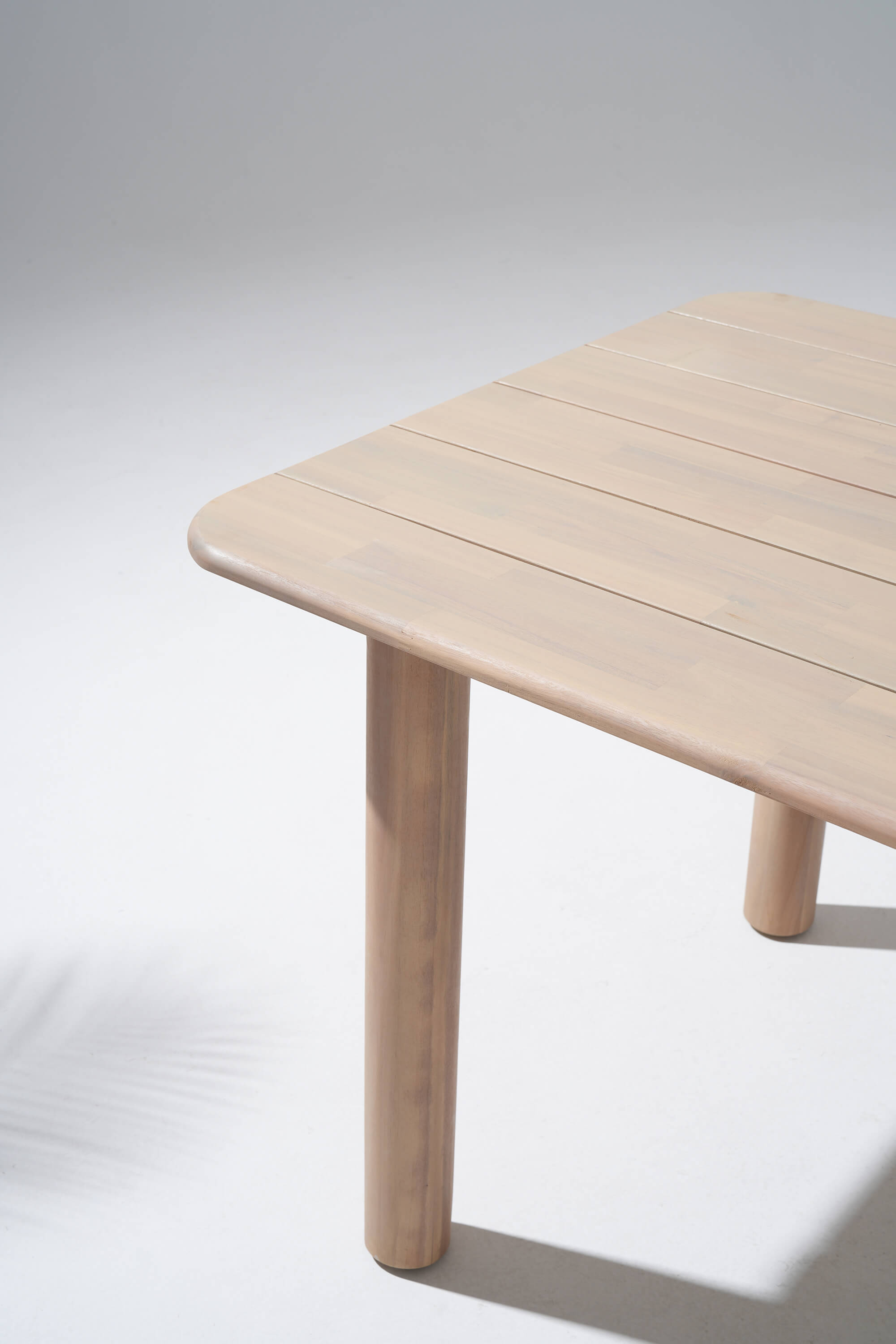 acacia Wooden dining table with a light finish