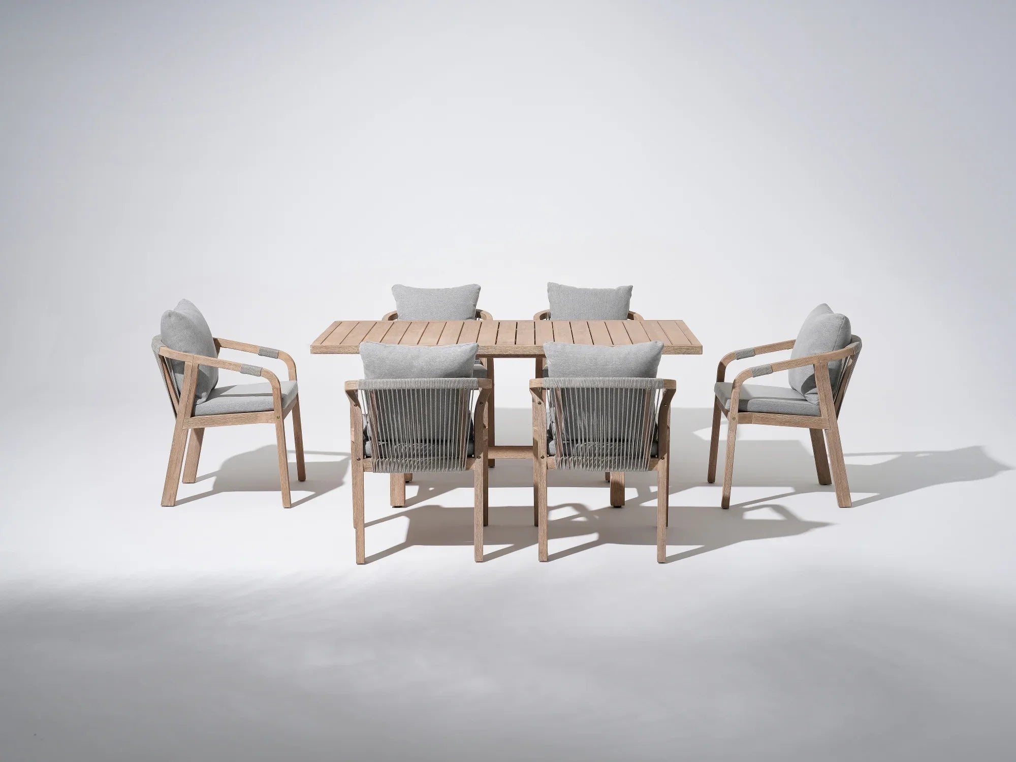 Wooden Outdoor Patio Dining Set For 6, a rectangular acacia wood outdoor dining table and 6 patio dining chairs with gray seat and back cushions, gray rope design - Jardina Premium Modern Outdoor Patio Dining Furniture Set
