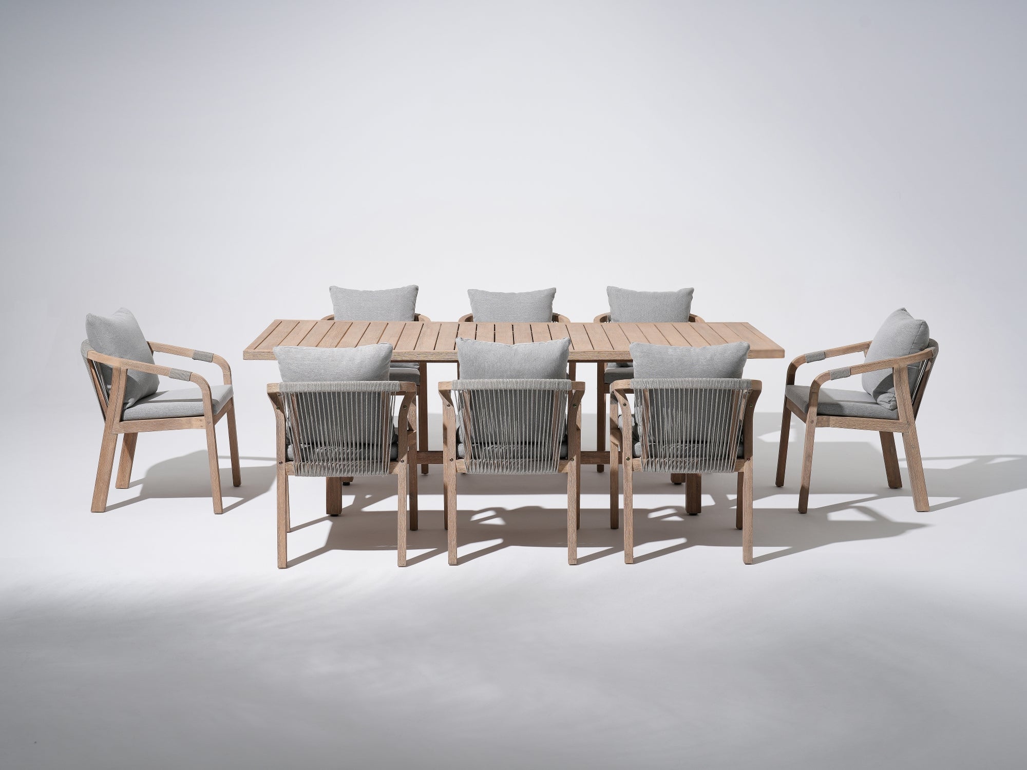 Wooden Outdoor Patio Dining Set For 8, a rectangular acacia wood outdoor dining table and 8 patio dining chairs with gray seat and back cushions, gray rope design - Jardina Premium Modern Outdoor Patio Dining Furniture Set