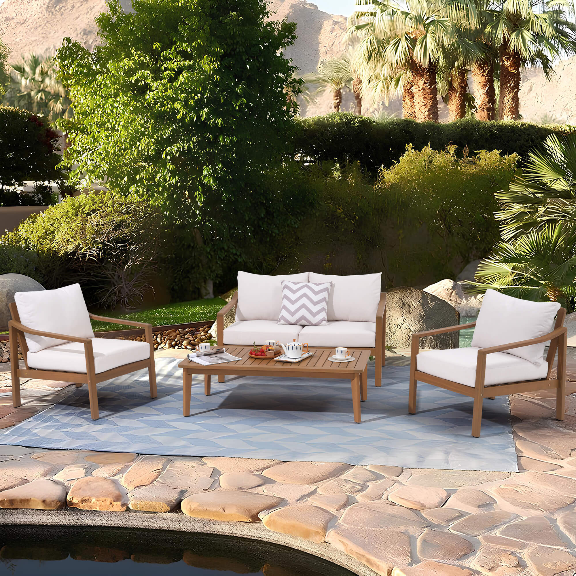 Noto 4 seats white Outdoor patio set with chairs and a table on a stone patio- Jardina Modern Premium Patio Outdoor Furniture