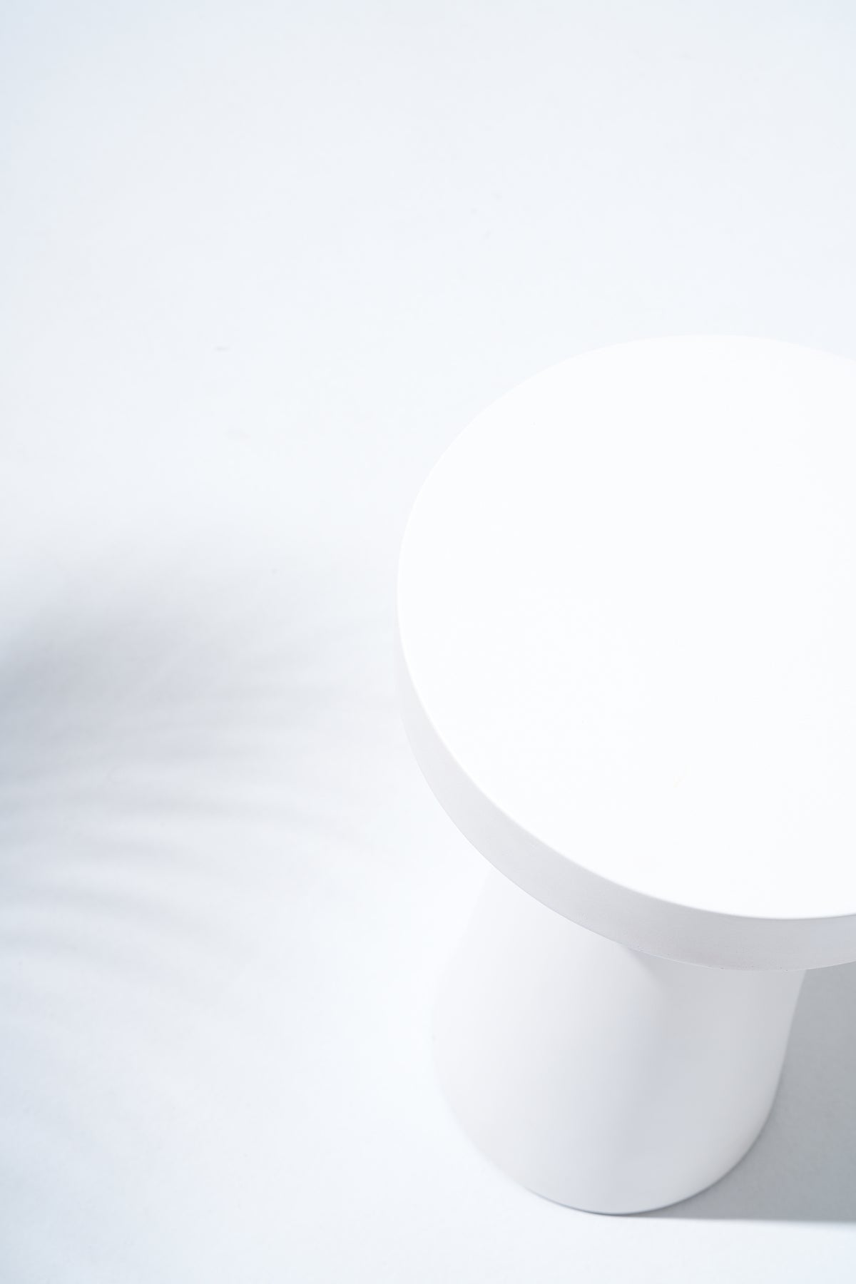 Matera Outdoor Concrete Side Table, Textured Travertine finish & Smooth Pure White