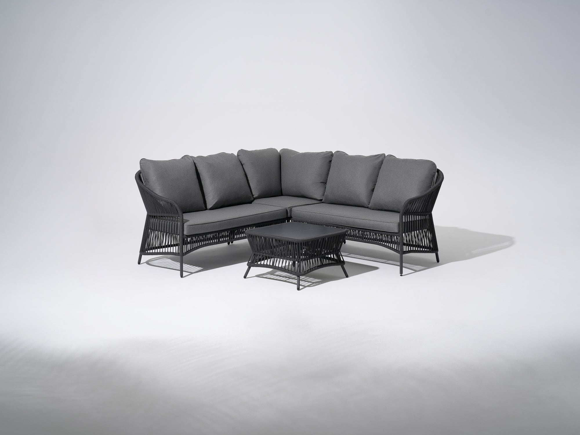 4-seat L-shaped outdoor sectionals, black Aluminum patio conversation set with black rope design and gray cushions, a square coffee table with black rope design - Jardina Premium Modern Outdoor Patio Furniture Set