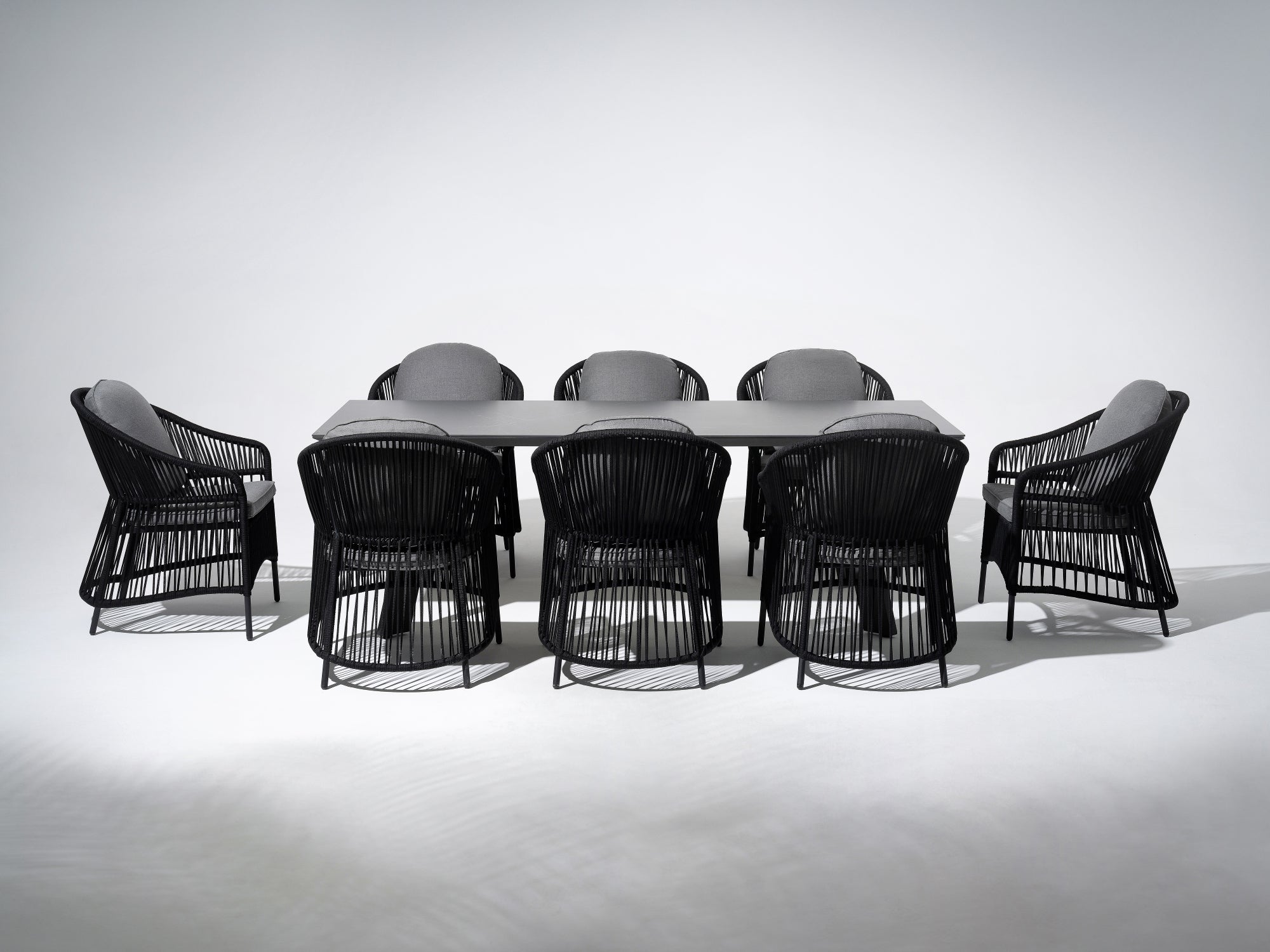 Aluminum Outdoor Dining Set For 8, grey aluminum rectangular patio dining table and eight dining chairs with black rope design and gray cushions - Jardina Premium Modern Outdoor Patio Dining Furniture Set