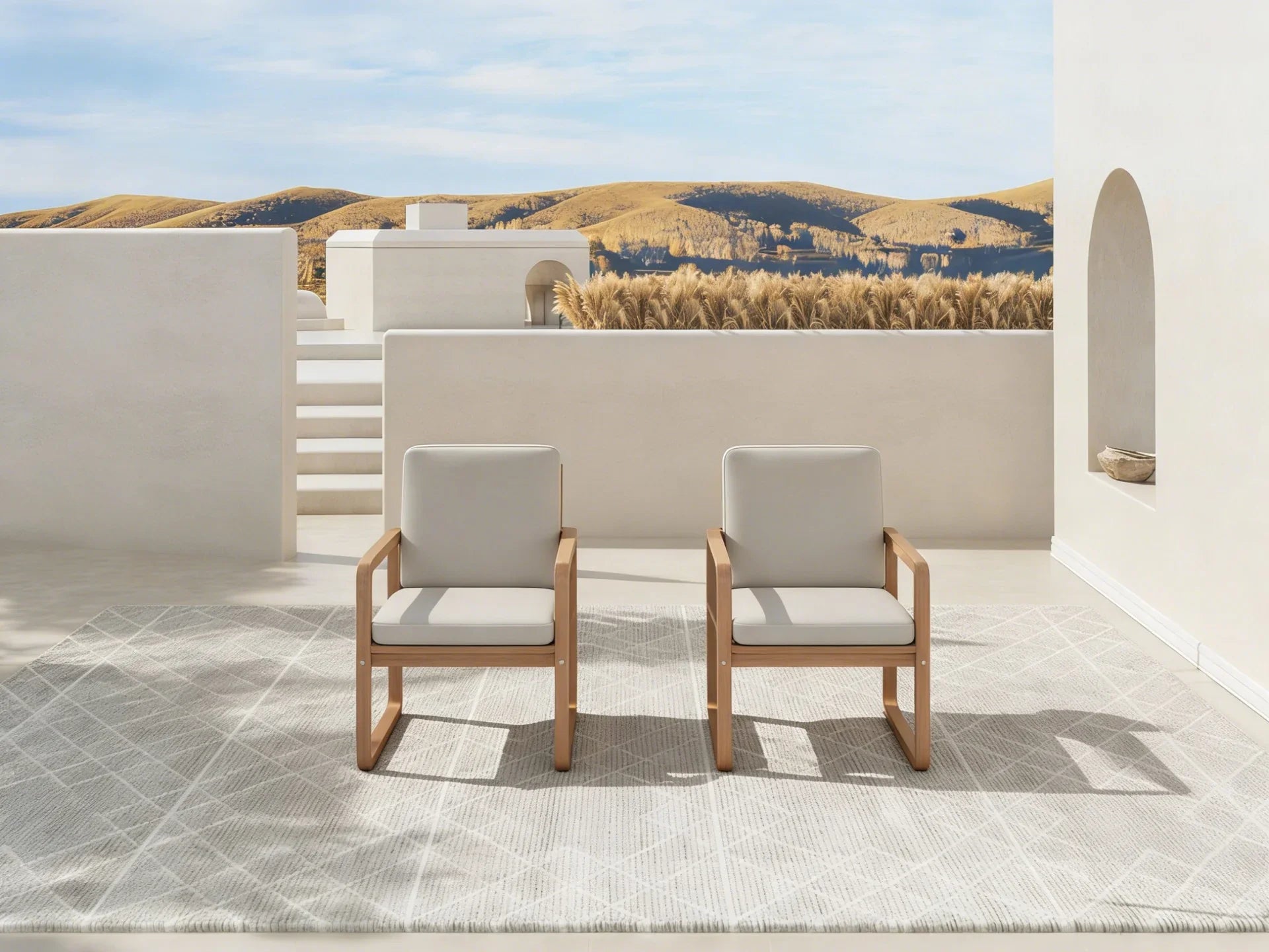 Two acacia wood outdoor chairs with beige cushions on a patio - Jardina Premium Modern Outdoor Dining Furniture