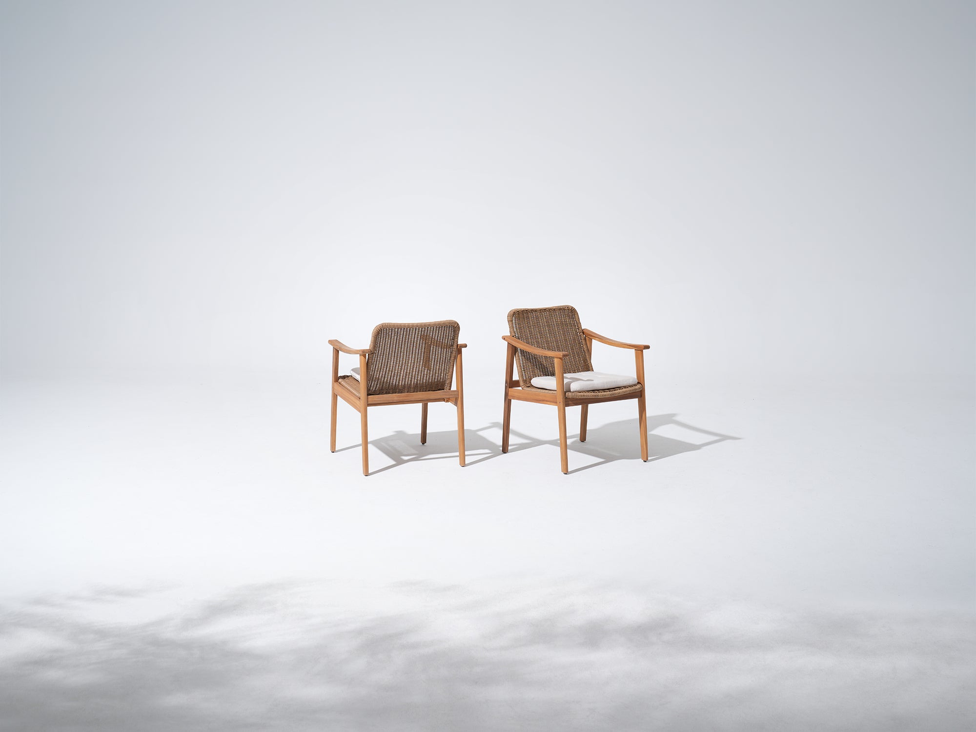 acacia Wood Outdoor Dining ArmChairs, Handwoven Rattan Design, White seat Cushions - Jardina Premium Modern Outdoor Dining Furniture
