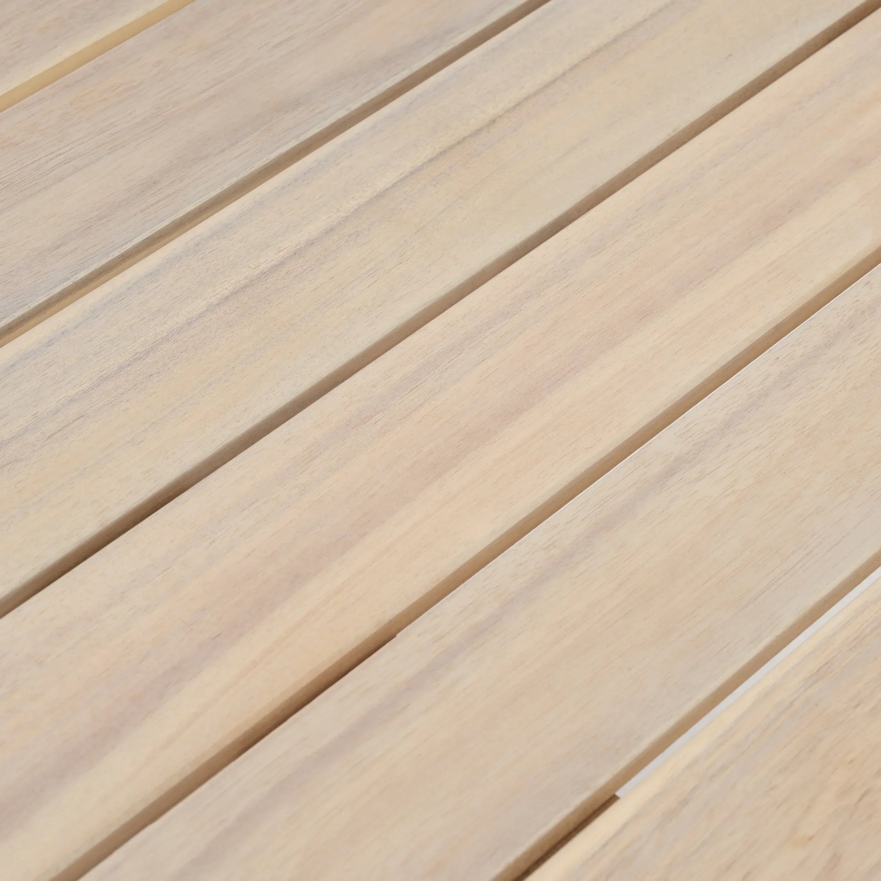Close-up of acacia wooden deck planks with a light brown color - Jardina Modern Premium Outdoor Patio Furniture Sets