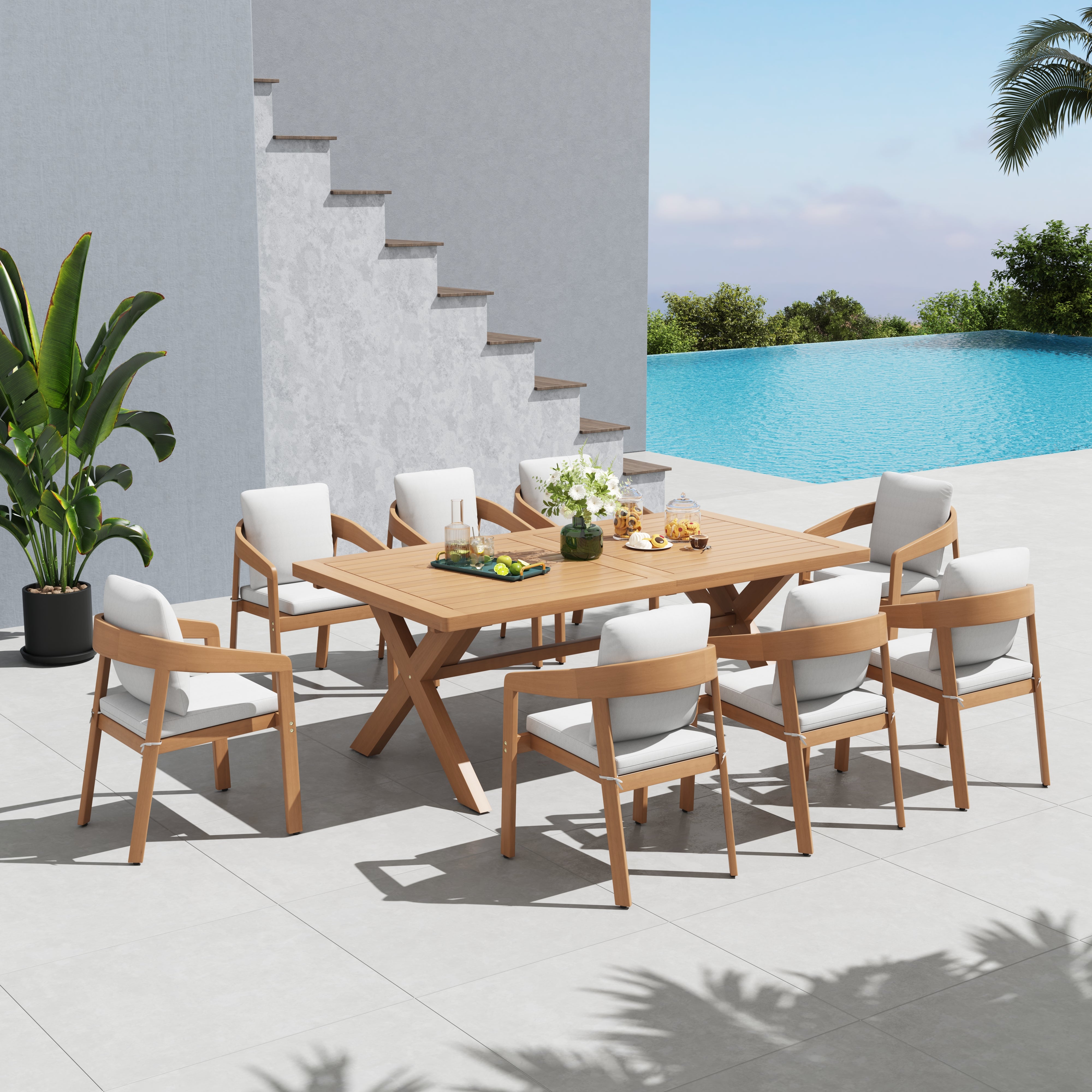 9pcs Outdoor dining set with wooden table and chairs by a poolside - Jardina’s Modern Premium Outdoor Furniture