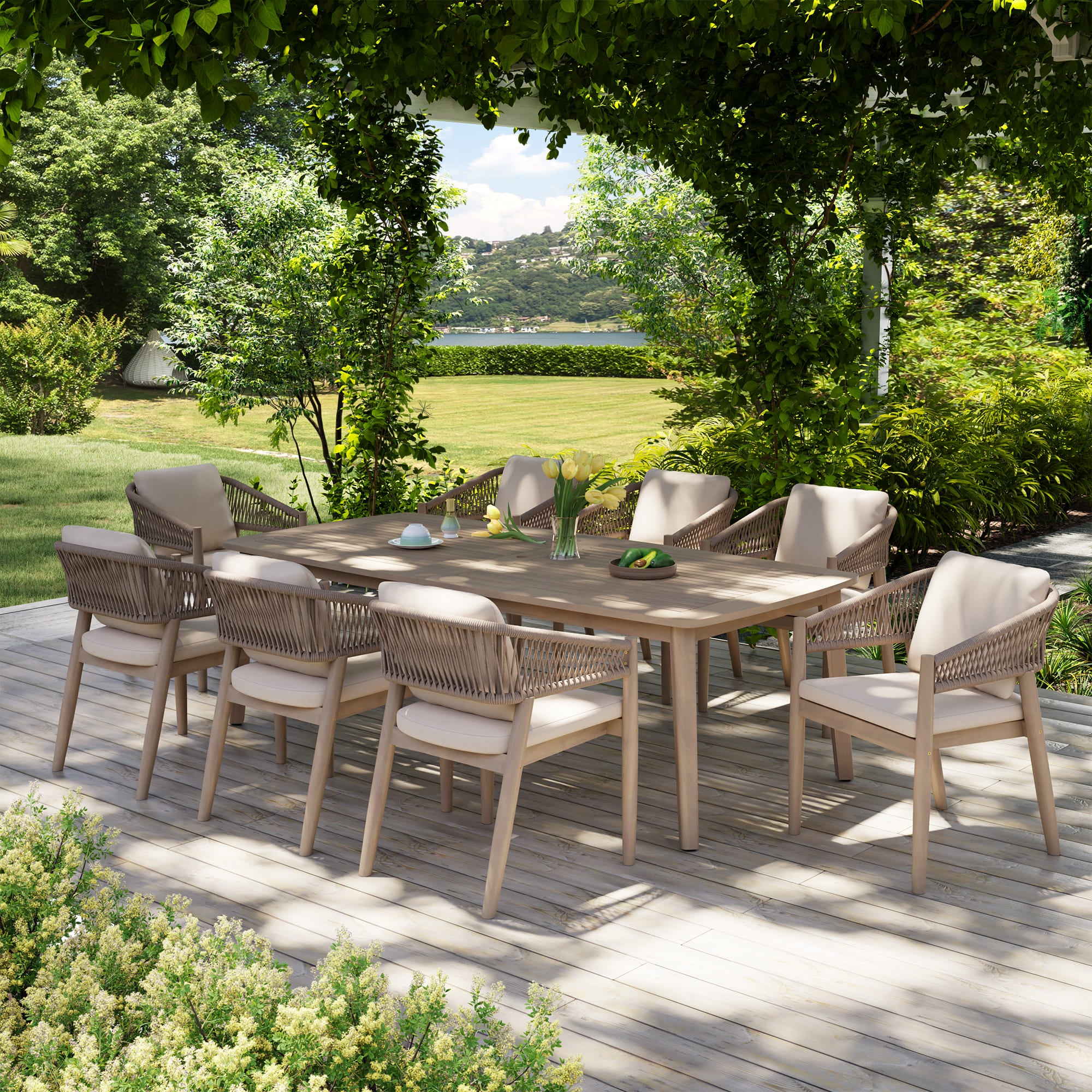 Outdoor dining set for 8 with acacia wooden table and chairs on a deck, surrounded by greenery - Jardina Premium Modern Outdoor Dining Furniture