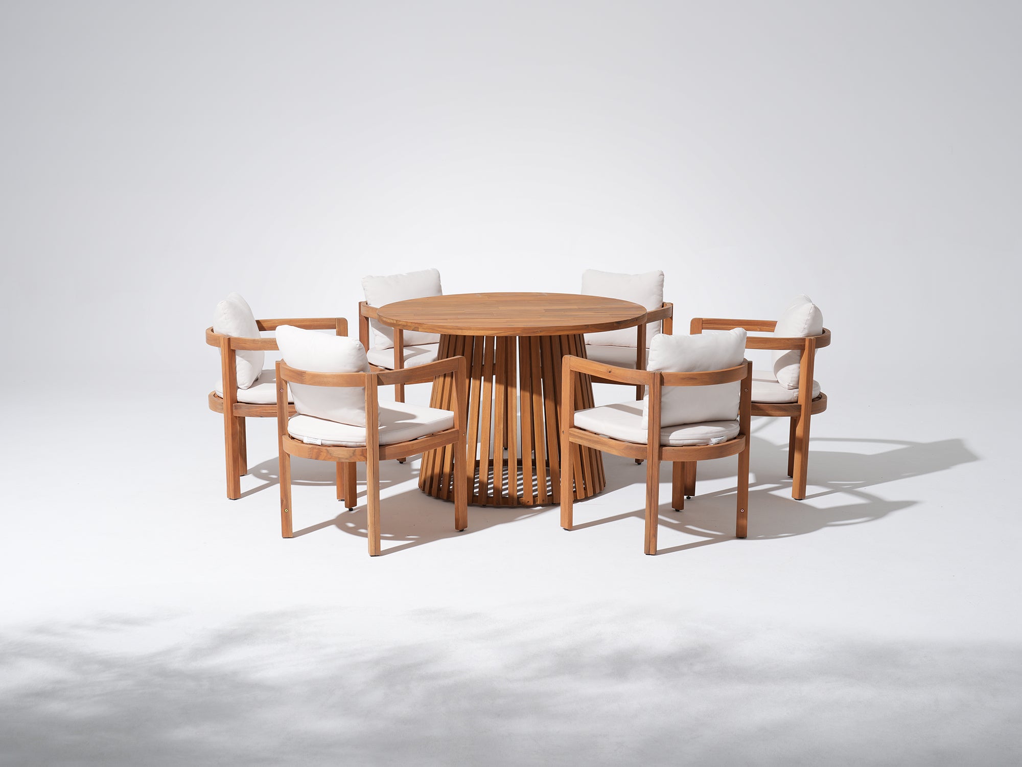 Round acacia Wooden dining table with six chairs for 6 people, white cushions - Jardina Premium Modern Outdoor Dining Furniture