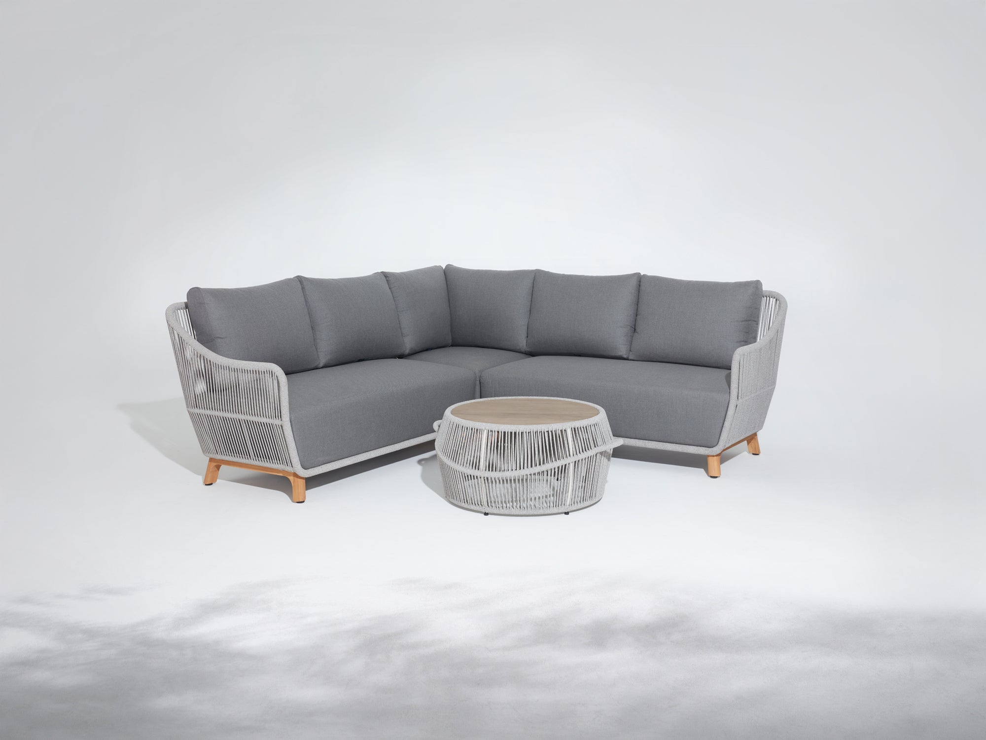 Gray L-shaped outdoor sectional sofa with a matching rope round coffee table, teak wood frame - Jardina modern premium outdoor patio furniture set