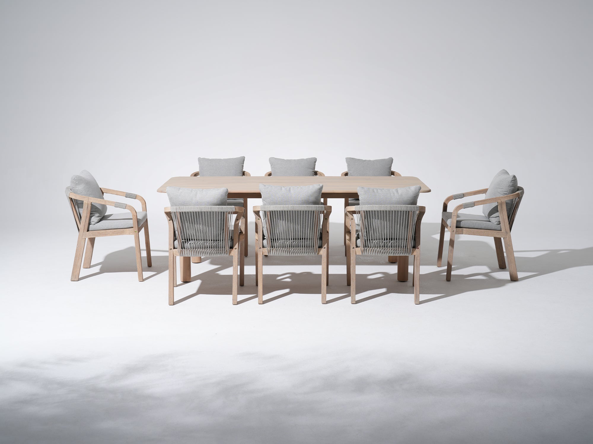 acacia wood outdoor dining table set for 8 people with rope design, a rectangular dining table with 8 chairs- Jardina Premium Modern Outdoor Dining Furniture