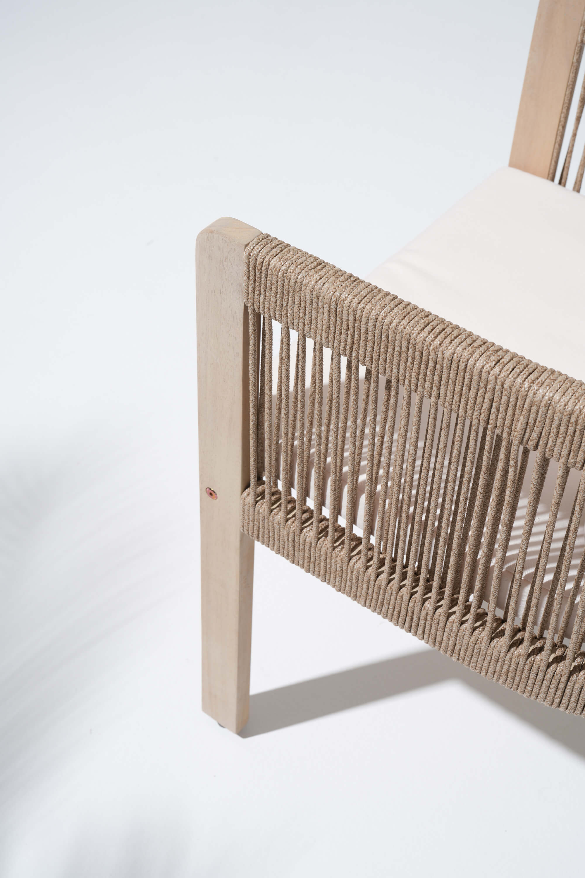 Close-up of a chair with woven rope backrest - Jardina Modern Premium Outdoor Patio Furniture