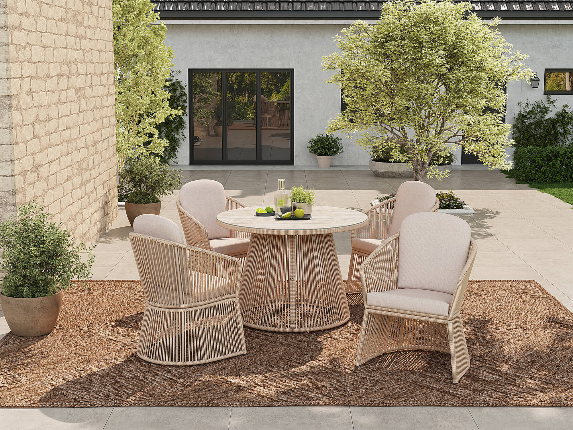 Outdoor patio dining set for 4 with wicker swivel chairs and a round glasstop dining table