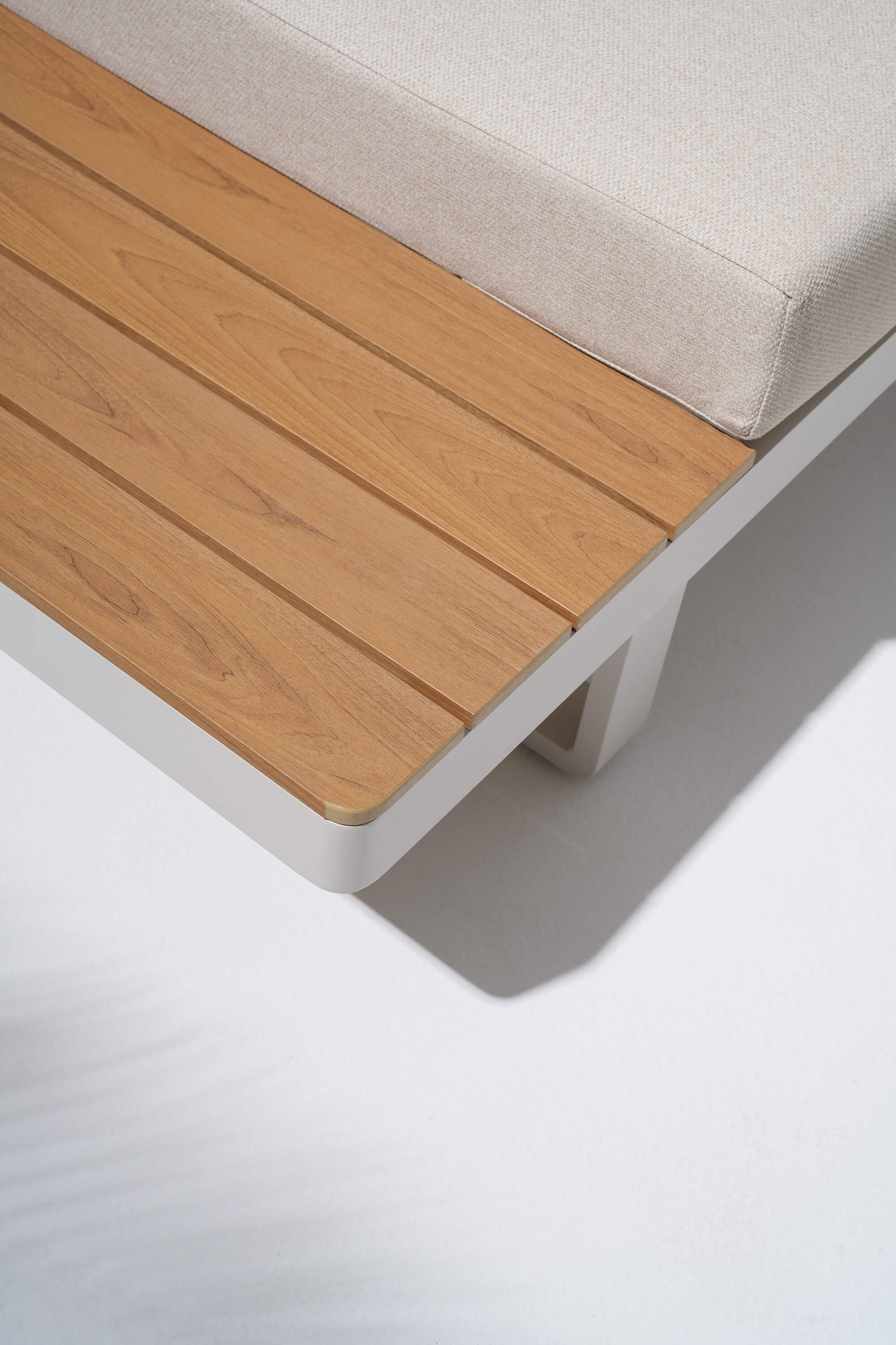 Addison outdoor sectional built-in wooden side table detail