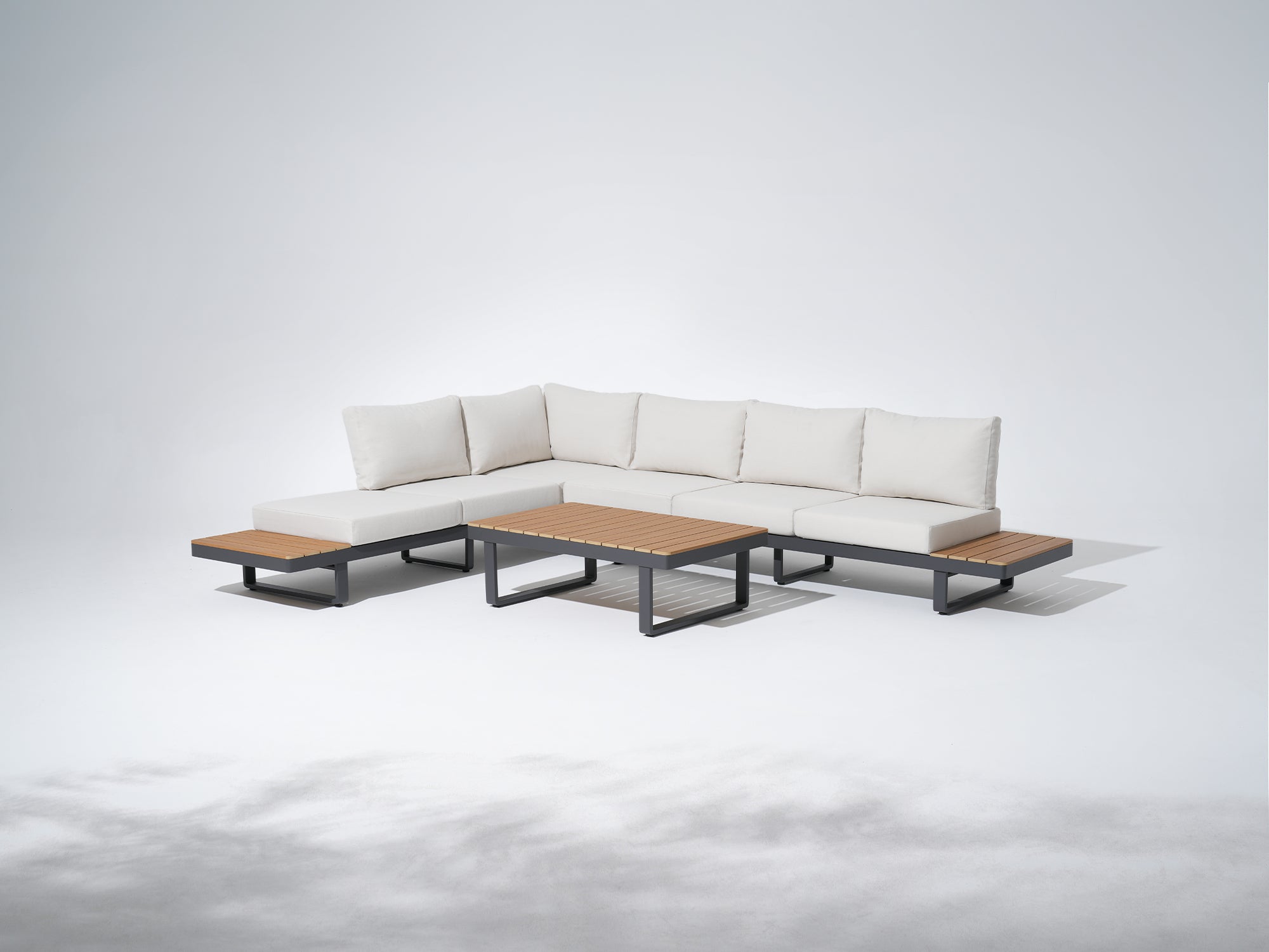 Addison Sectional outdoor sofa with wooden tables, dark grey aluminum frame and thick cushions
