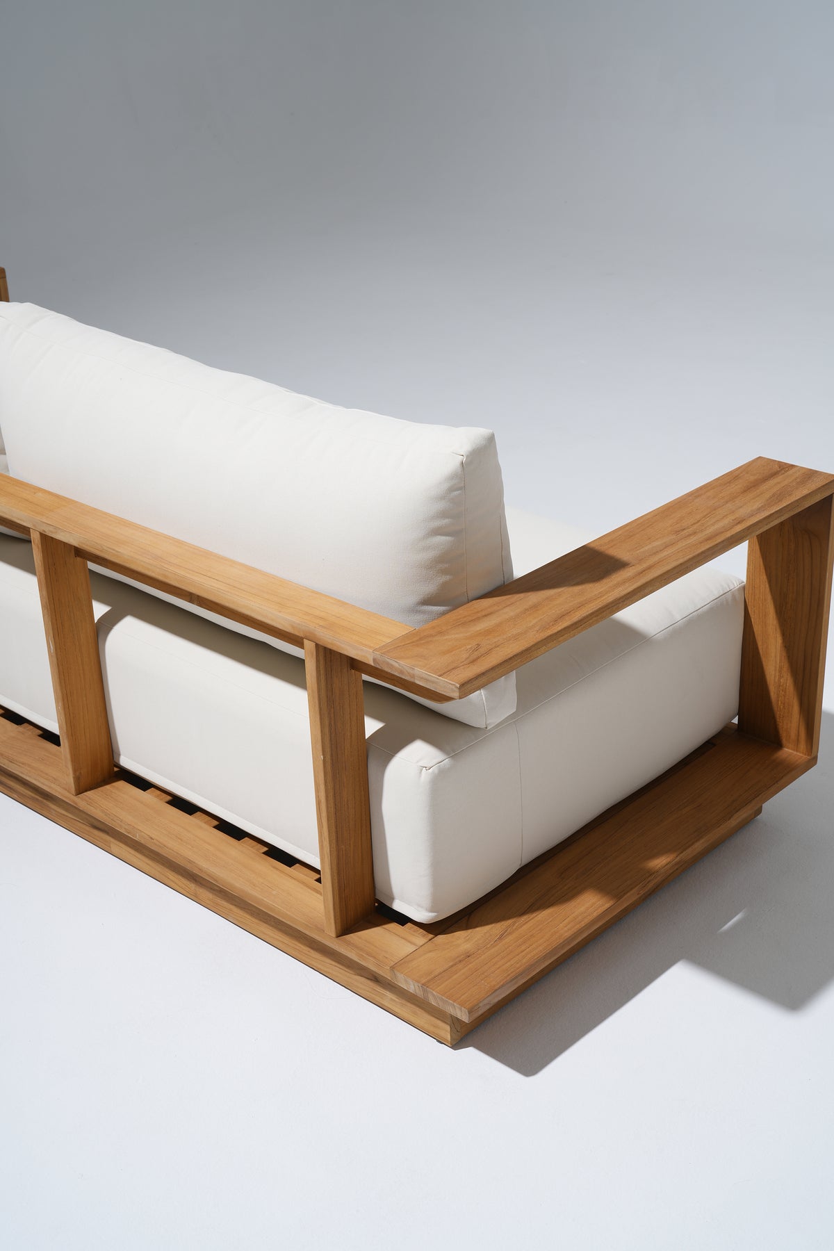close-up of Braga teak wood outdoor couch with wide armrest and backrest design- Jardina