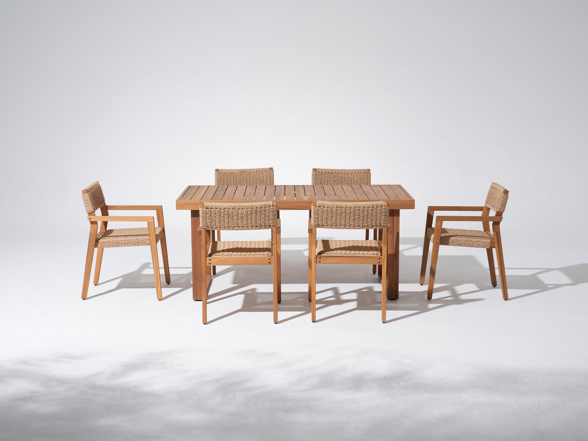 Nalia Outdoor Wood Dining Set with Ratten Arm Chairs for 6, Umbrella Hole Design, 67" Sled-Leg