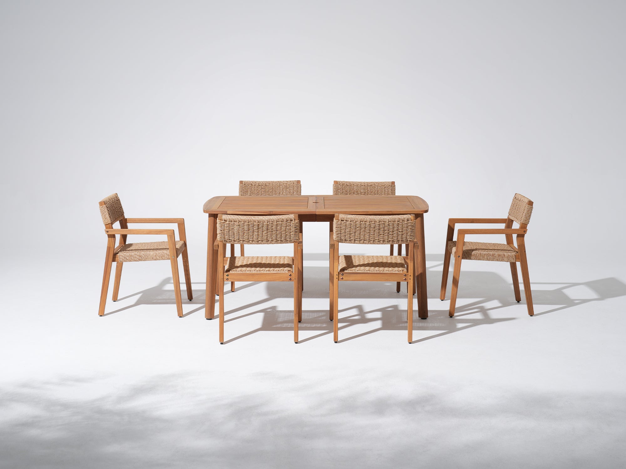 Nalia Outdoor Wood Dining Set with Ratten Arm Chairs, Umbrella Hole Design, 63" Tapered Legs