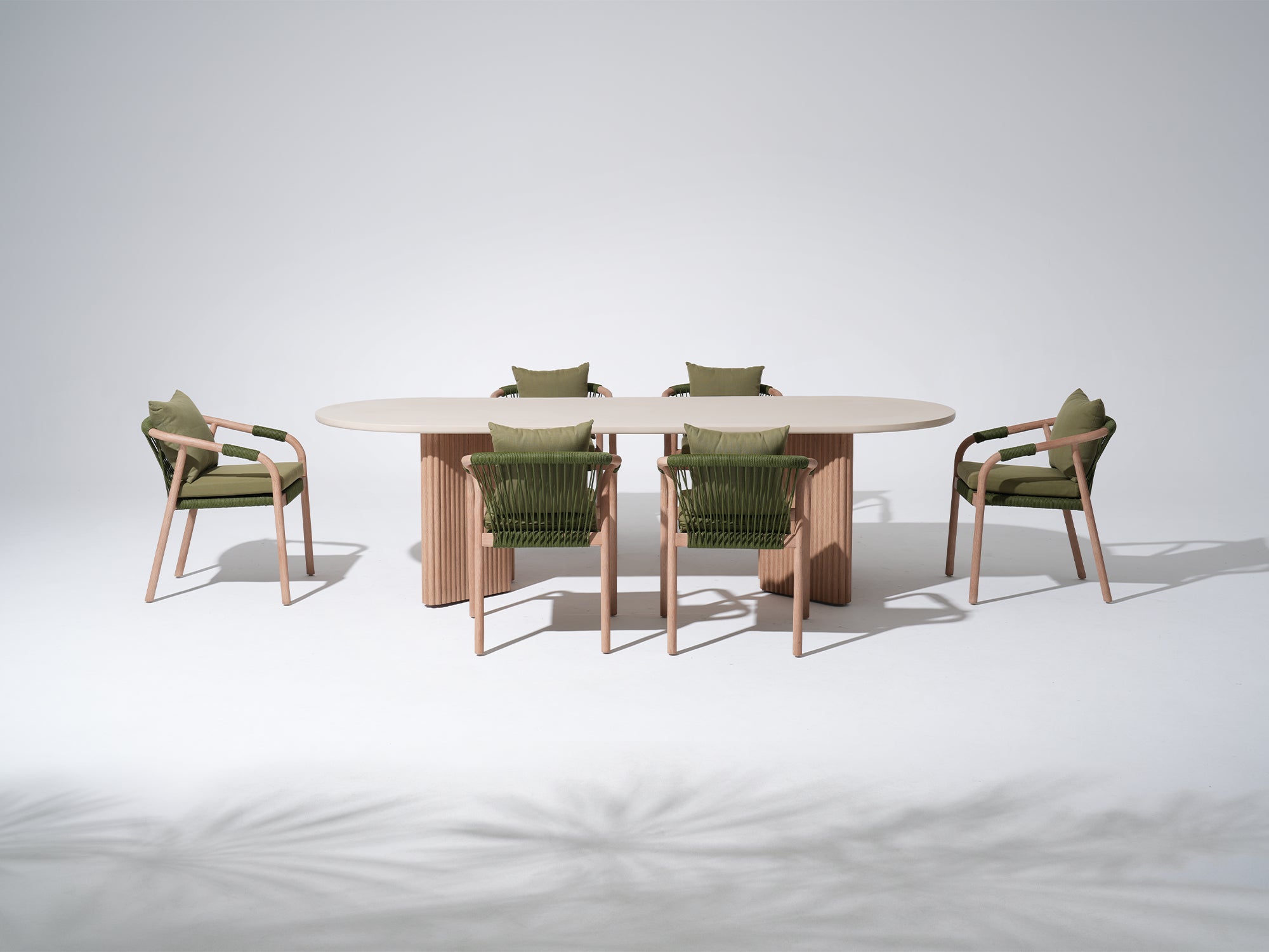 Outdoor furniture dining set with a round wood table and six chairs, green cushions- Jardina Modern Premium Outdoor Patio Furniture Dining Set