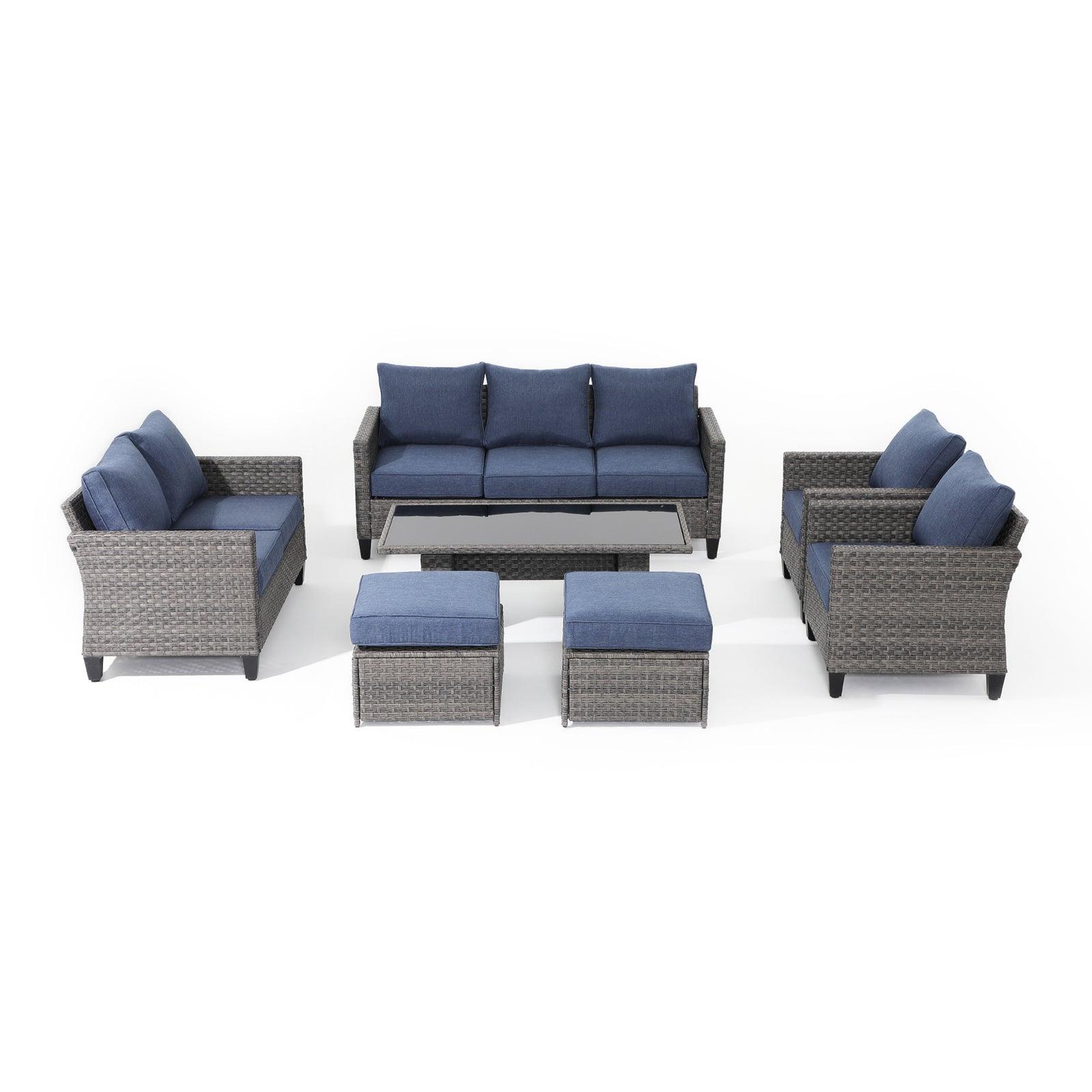 Ayia 7-Piece outdoor Sofa Set with Rattan design, Navy Blue cushions, a 3-seater sofa, 2 armchairs, 2 ottomans, 1 loveseat, 1 lift-top outdoor dining table, front view - Jardina Furniture #color_Navy blue#piece_7-pc. with ottomans & Table