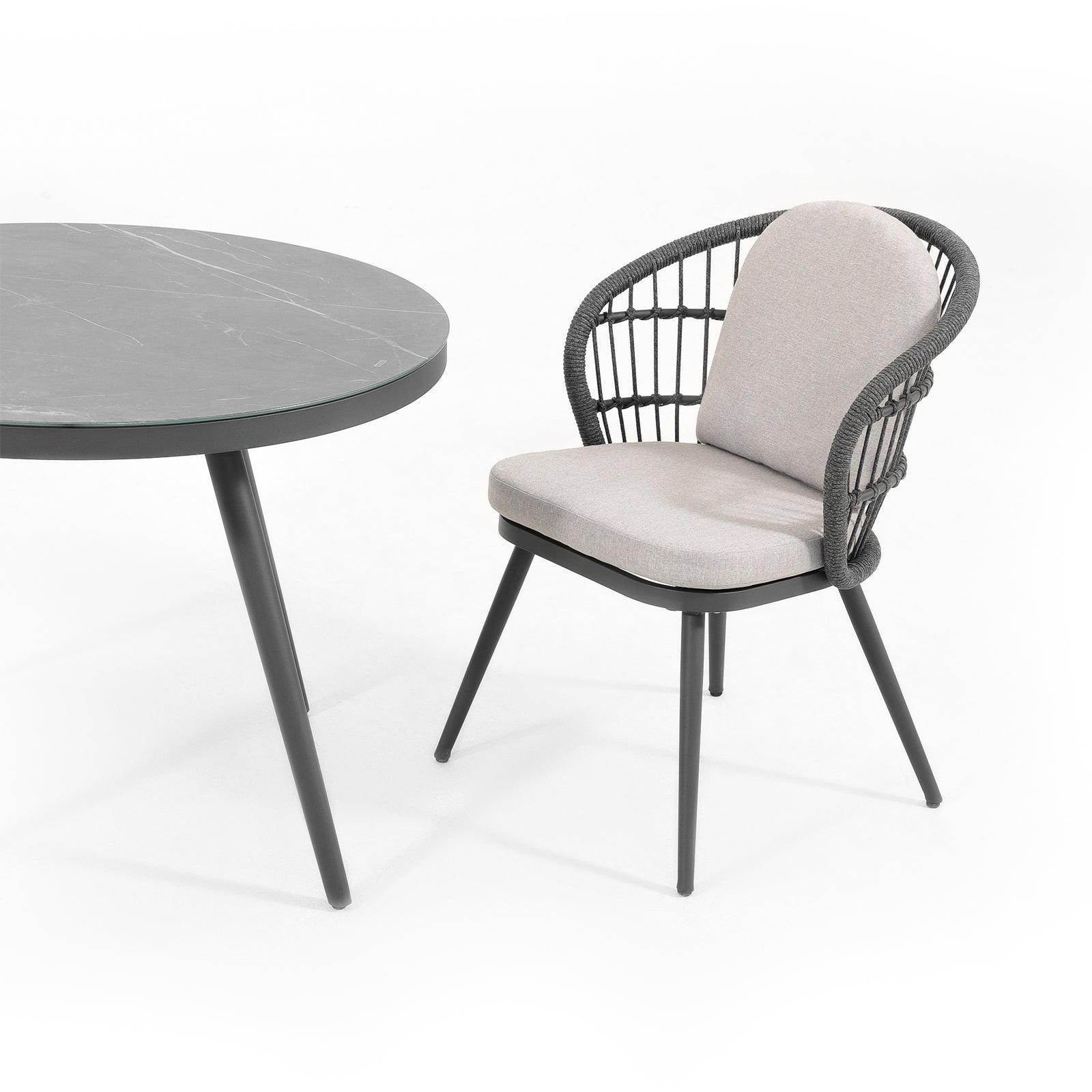 Comino dark grey outdoor dining chairs with aluminum frame and rope design, light grey cushions, left view- Jardina Furniture